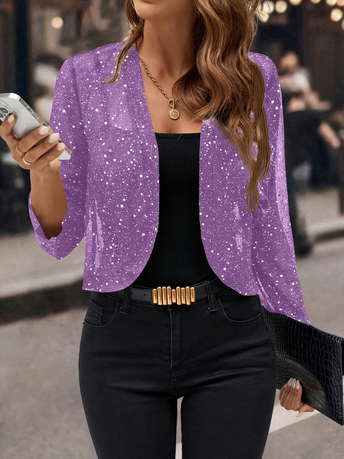 Blazer court à paillettes coloris violet, col ouvert arrondi, manches longues, coupe crop sur top noir