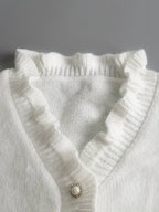 Blouse à volants pour femmes avec boutons décoratifs décolleté fluide féminine élégante décontractée chic – Darcey
